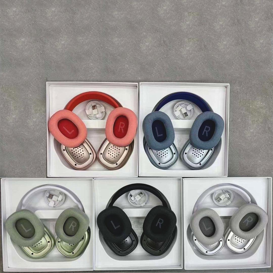 Set of  The AdiStore Adi Max (ANC) headphones in various colors displayed in a box on a gray surface.